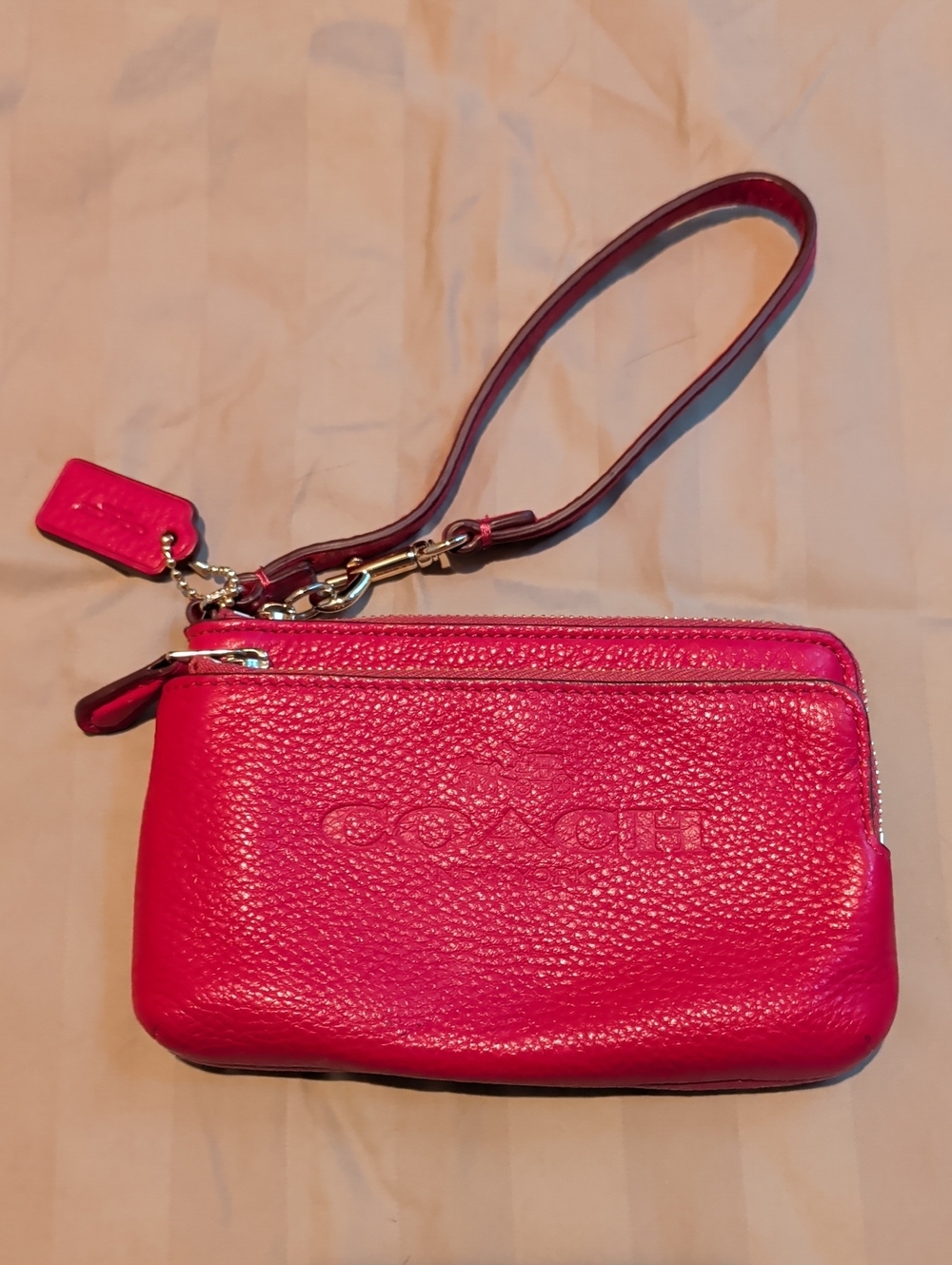 Coach Bright Pink Pebbled Leather Wristlet Clutch